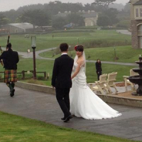 A bagpiper and a bride and groom in San Francisco CA